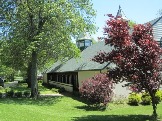 Pasture and mature trees at Crestwood Farm in Lexington, Kentucky